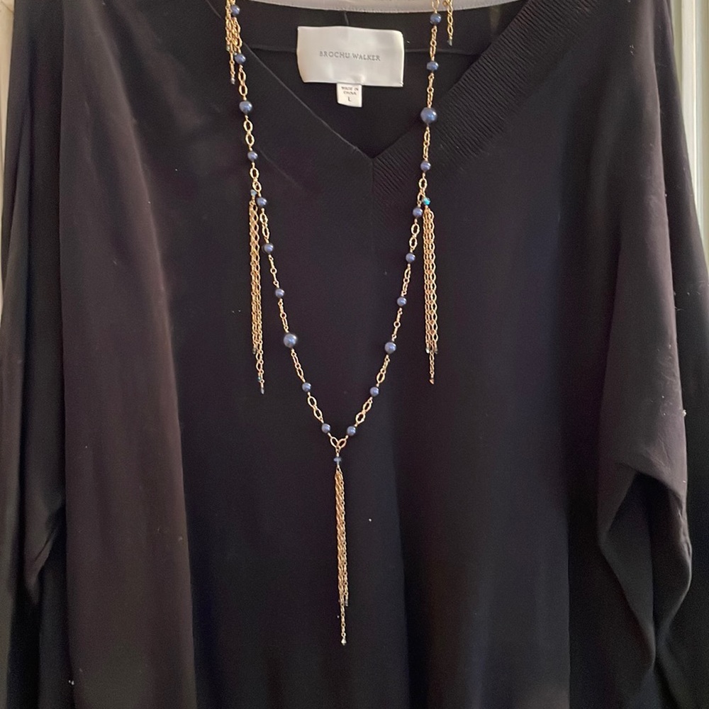 Pretty navy bead and gold arty necklace.